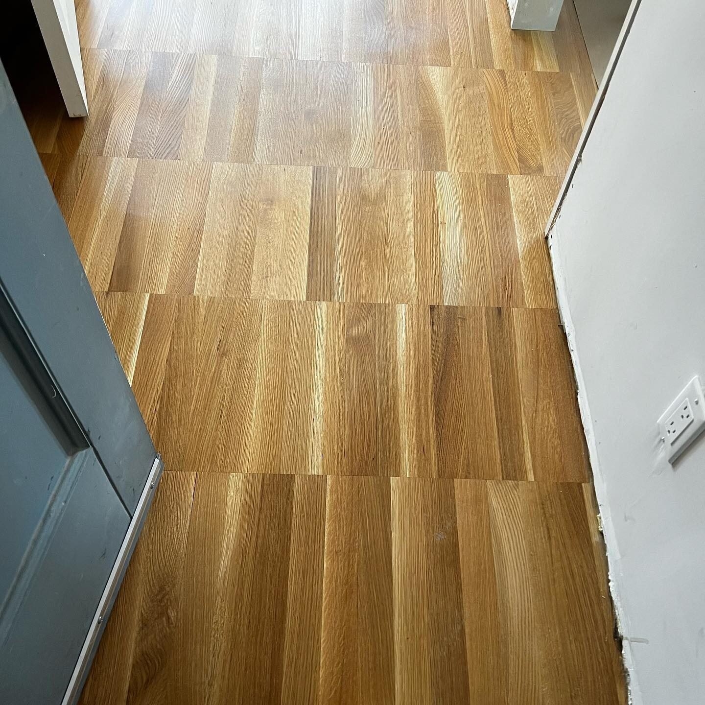 Close up of freshly sanded wood boards with a matte Rubio Monocoat finish in a NYC home.